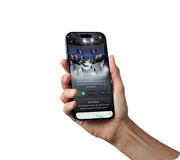 A hand holding a phone showing an event page